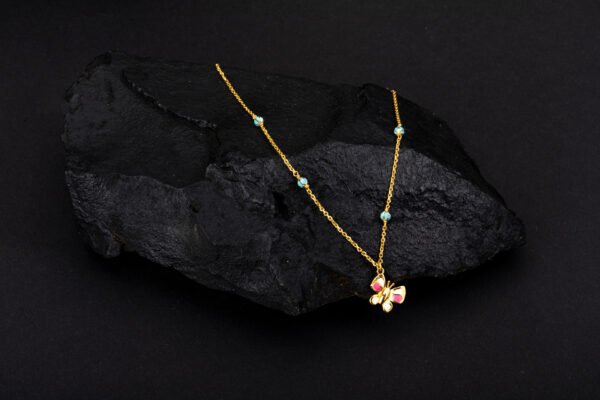 gold chain with butterfly pendent