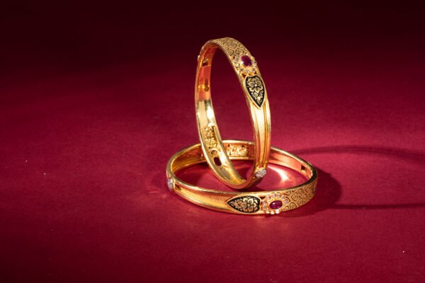 gold kanagan for ladies wit red diamond