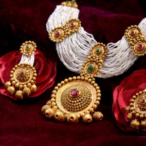 gold necklace and earrings