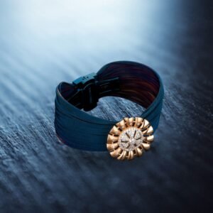 gold ring with blue belt