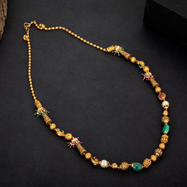 golden mala type necklace