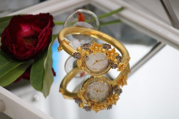 kada style golden watch for ladies