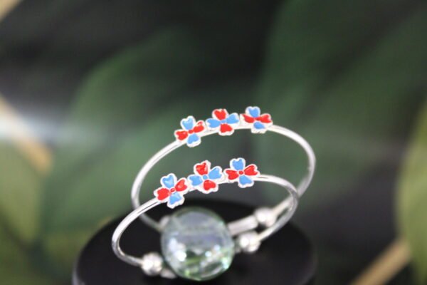 red and blue flower design silver kadli