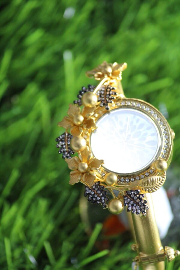 silver and gold bracelet watch