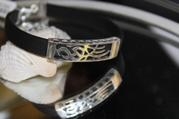 silver bracelet with black belt