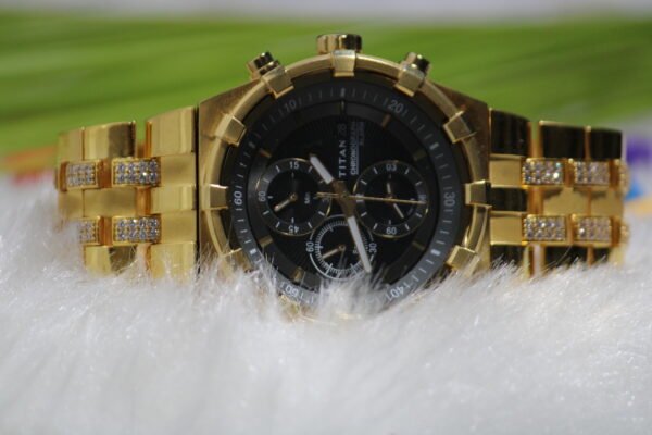 titan gents watch with golden belt